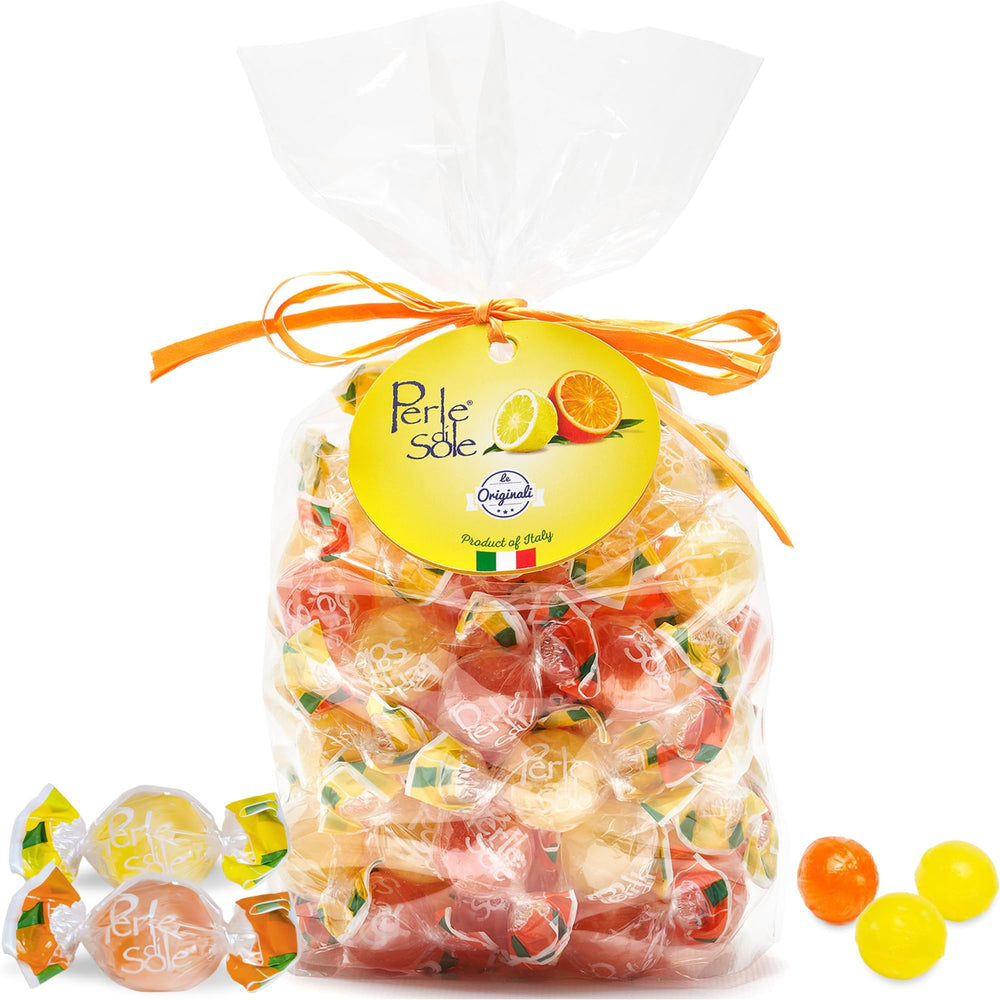 Perle di Sole orange-lemon drops with fizzy core, ideal for refreshing on-the-go snacking.