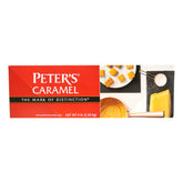 Peters Chocolate caramel block melting to dip apples for homemade caramel apples.