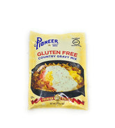 Pioneer Brand Gravy Mix Packet pouring over roast meat for a rich finish.