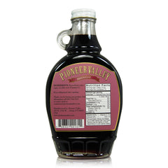 Close-up of Pioneer Valley Boysenberry Fancy Syrup jar with real ingredients.