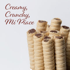 Pirucream wafers served with coffee for a refined treat.