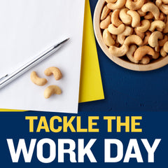Planters Deluxe Salted Whole Cashews held in hand for a quick energy boost