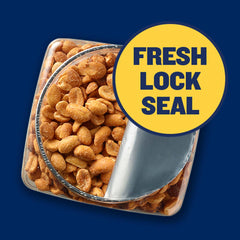Planters dry roasted peanuts case pack on pantry shelf for sharing