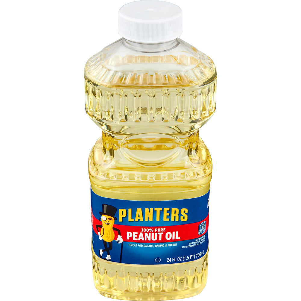 PLANTERS Peanut Oil bottle on kitchen counter ideal for frying and sautéing.