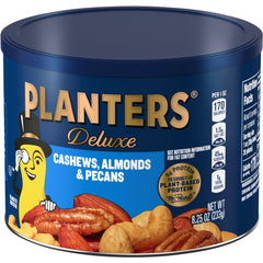 Planters Select Cashews Almonds Pecans in a kitchen scene ready to snack.