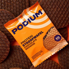 Podium Protein Stroopwafel chocolate brownie cookie close-up with caramel filling.