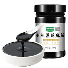 PoetrySeptember black sesame paste in a jar, silky texture perfect for dressings and spreads.