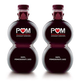 POM Wonderful 100% Pomegranate Juice bottle pours, antioxidant-rich flavor.