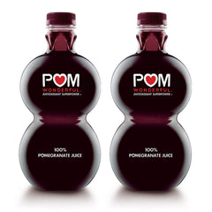 POM Wonderful 100% Pomegranate Juice bottle pours, antioxidant-rich flavor.