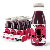 Pomona Organic Juices grape juice pours into a glass, a single-ingredient, preservative-free option.