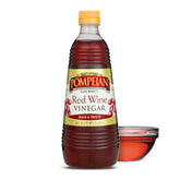 Pompeian Red Wine Vinegar bottle on kitchen counter for vibrant dressings.