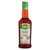 Ponti red wine vinegar bottle on a kitchen counter, ideal for bright salads.