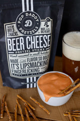POP DADDY Beer Cheese pretzel sticks on a party platter