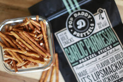 Three-pack of Pop Daddy pretzel sticks in resealable bags for easy sharing