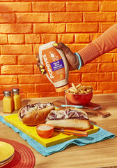 Popeyes Mardi Gras Mustard dipping shrimp with horseradish zing.
