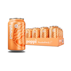 Poppi Orange Cream Soda bottle pouring with bright bubbles for a refreshing, prebiotic sip.