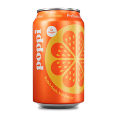 Poppi Orange Soda bottle on counter, highlighting premium prebiotic refreshment.