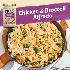 Prego Alfredo sauce pouring over pasta to enhance aroma and richness