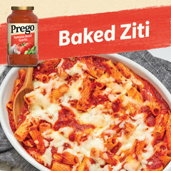 Prego sauce pouring jar showing thick, smooth texture over pasta.