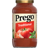 The Prego Traditional Pasta Sauce jar on a pantry shelf for family meals.