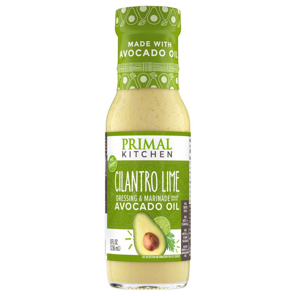 Primal Kitchen Cilantro Lime Dressing bottle ready to drizzle on salads.