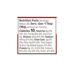 Primal Kitchen Ketchup Unsweetened label closeup shows clean, no added sugar.