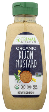 Primal Kitchen Dijon Organic Mustard jar on counter, ideal for sandwiches