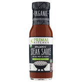Primal Kitchen Organic Steak Sauce bottle highlighting USDA Organic and sugar-free flavor.