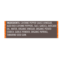 Primal Kitchen No Dairy Buffalo Sauce on a burger adds zesty, dairy-free kick