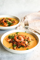 Professor Torbert's Orange Corn Grits creamy bowl closeup highlighting silky texture.