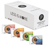 Protein Puck variety pack bars displayed on shelf for on-the-go energy.