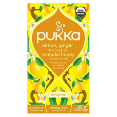 Pukka tea bag steeping shows Manuka honey sweetness and turmeric warmth