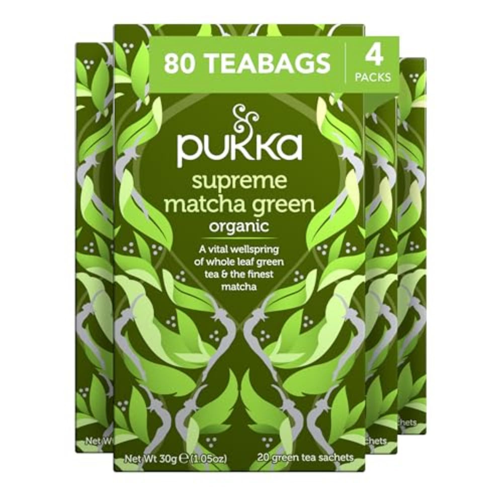 Pukka Supreme Matcha tea bag closeup showcasing vibrant, caffeine-free infusion aroma.