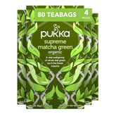Pukka Supreme Matcha tea bag closeup showcasing vibrant, caffeine-free infusion aroma.