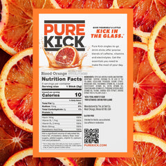Stacks of Pure Kick Blood Orange boxes showing convenient six-stick sets.
