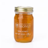 Pure Southern Honey raw honeycomb jar showing natural sweetness for tea and toast.