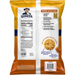 Family enjoying Quaker Caramel Rice Crisps at a picnic