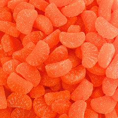 Queen City Candy Cave bright orange slices close-up for fruity snacking and sharing.