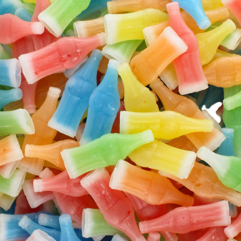 Queen City Candy Cave Nik-L-Nips syrup-filled bottle candy for nostalgic gatherings.