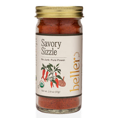 Rachel Beller's Power Pantry Savory Sizzle bottle pour showcases bold flavor for roast vegetables