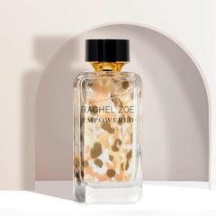 Spray mist emerging from Rachel Zoe Empowered EDP for easy application