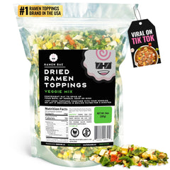 Ramen Bae Veggie Mix being poured into a steaming ramen bowl for flavor boost