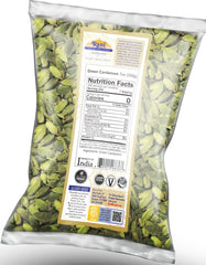 Close-up of green cardamom pods releasing fragrant oils for chai and desserts.