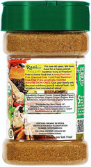 Pouring Rani Garam Masala from the jar to flavor a simmering sauce.