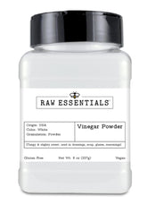 Raw Essentials white vinegar powder bottle showing convenient tangy flavor enhancement