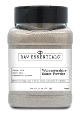 Raw Essentials Worcestershire Powder bottle close-up showing bold tangy flavor for stews and sauces.