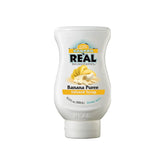Reàl Infused Exotics Banana Puree Syrup bottle front ideal for fruit-forward cocktails