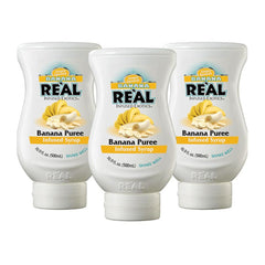 Real Infused Exotics banana puree syrup bottle pour showcases rich banana flavor for cocktails