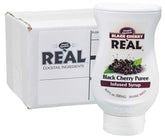 Reàl Infused Exotics Black Cherry Syrup bottle front highlighting premium cherry flavor.