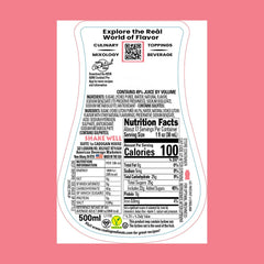Reàl Infused Exotics Lychee squeeze bottle closeup for easy dispensing.